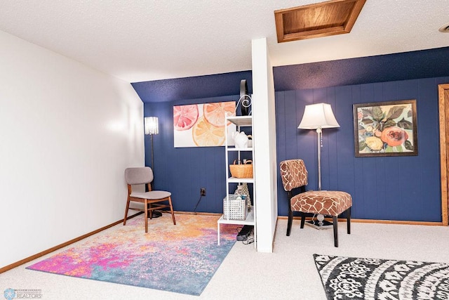 722 Elm St N Unit A8, Fargo, ND 58102 - bedroom featuring carpet, attic access, and a textured ceiling