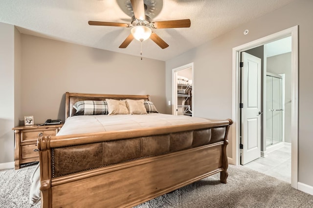 9902 5th Street Ln N, Lake Elmo, MN 55042 - bedroom featuring light carpet, ceiling fan, and a textured ceiling