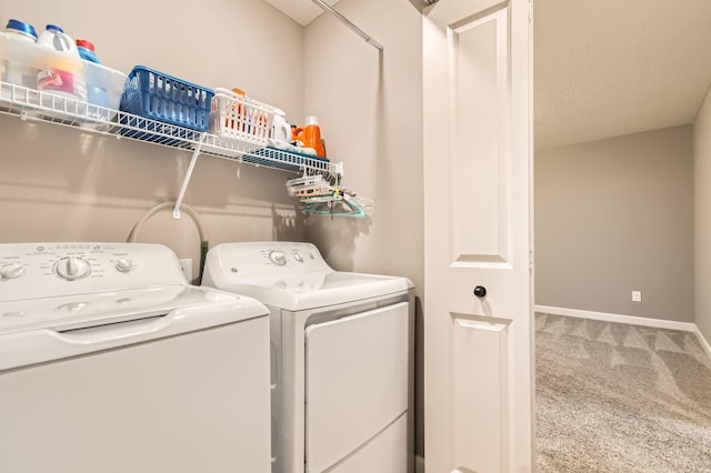 9902 5th Street Ln N, Lake Elmo, MN 55042 - laundry area featuring washer and dryer and carpet floors