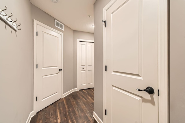9902 5th Street Ln N, Lake Elmo, MN 55042 - hall featuring dark wood-type flooring and baseboards