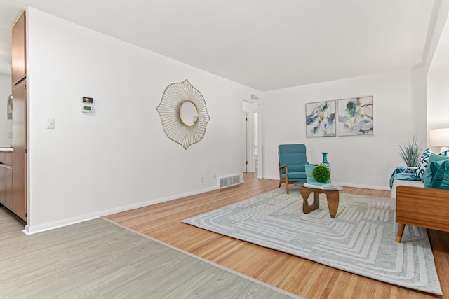 1007 Ingerson Rd, Shoreview, MN 55126 - living area featuring light wood-style flooring and baseboards