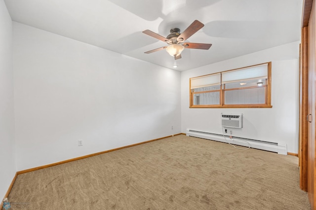 2319 10th St S, Fargo, ND 58103 - carpeted spare room with a baseboard heating unit, a ceiling fan, and a wall unit AC