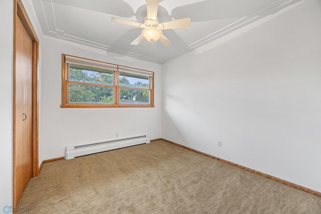 2319 10th St S, Fargo, ND 58103 - carpeted empty room with baseboard heating and ceiling fan