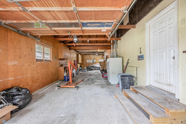 2319 10th St S, Fargo, ND 58103 - garage featuring freestanding refrigerator