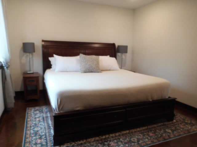 14650 Hilltop Rd, Ashby, MN 56309 - bedroom featuring dark wood-style flooring