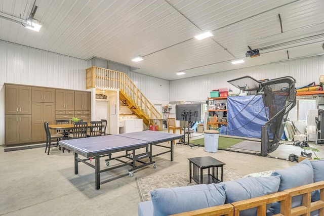 14650 Hilltop Rd, Ashby, MN 56309 - game room featuring concrete floors and independent washer and dryer