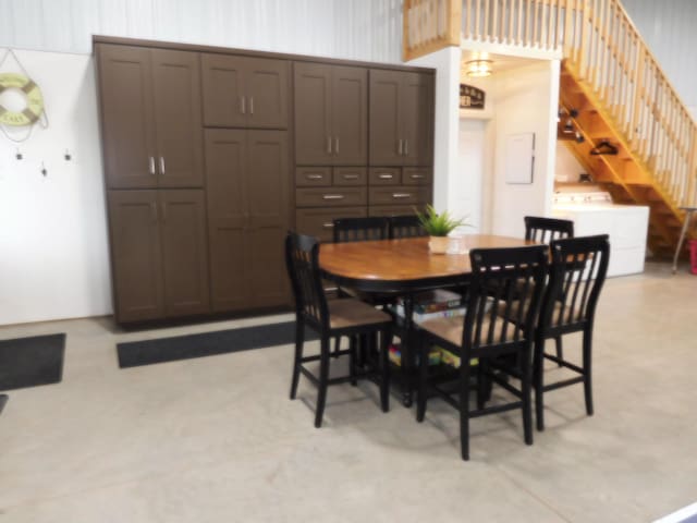 14650 Hilltop Rd, Ashby, MN 56309 - dining area featuring washer / clothes dryer and stairs