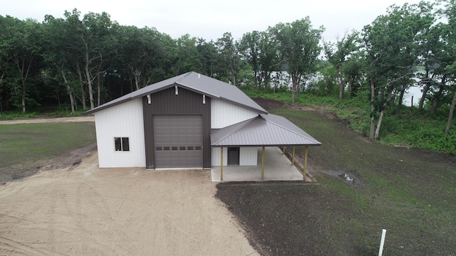 14650 Hilltop Rd, Ashby, MN 56309 - garage with driveway and a garage