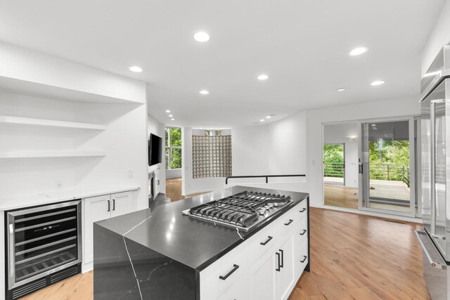 3520 Fairway Ln, Minnetonka, MN 55305 - kitchen featuring wine cooler, appliances with stainless steel finishes, light wood finished floors, recessed lighting, and white cabinetry