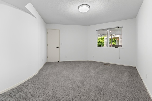 3520 Fairway Ln, Minnetonka, MN 55305 - unfurnished room with carpet floors and a textured ceiling