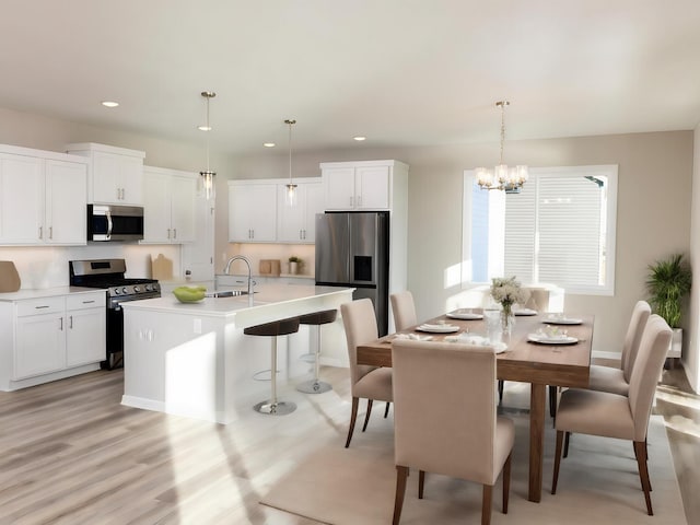 3237 Jandura Ave NE, Saint Michael, MN 55376 - dining area with a chandelier, recessed lighting, and light wood-style floors