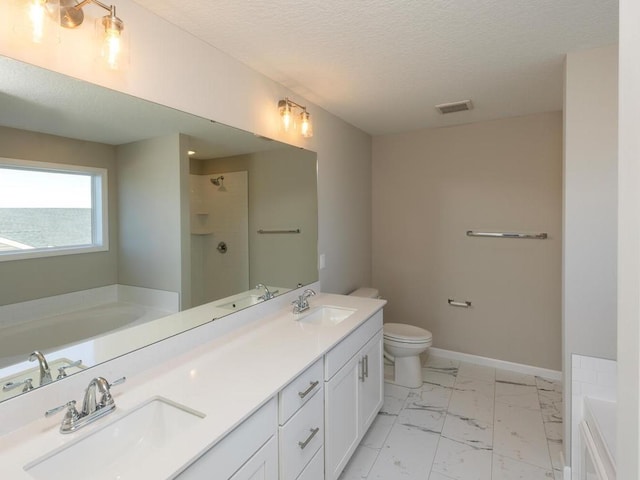 3237 Jandura Ave NE, Saint Michael, MN 55376 - full bath with a garden tub, marble finish floors, double vanity, a shower, and a textured ceiling