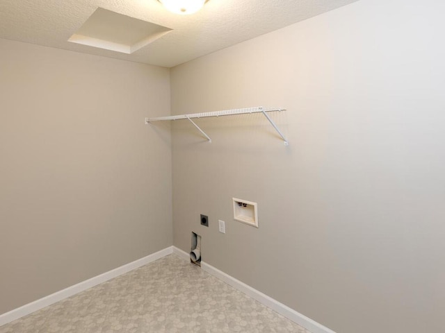 3237 Jandura Ave NE, Saint Michael, MN 55376 - laundry room with hookup for an electric dryer, hookup for a washing machine, light flooring, and a textured ceiling