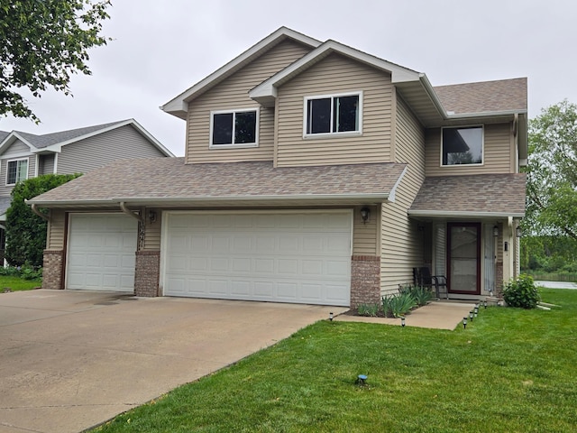 10641 Able St NE, Blaine, MN 55434 - traditional home featuring brick siding, driveway, and roof with shingles