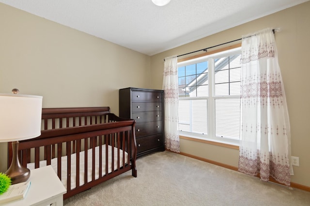 114006 Hundertmark Rd, Chaska, MN 55318 - carpeted bedroom with baseboards and a crib
