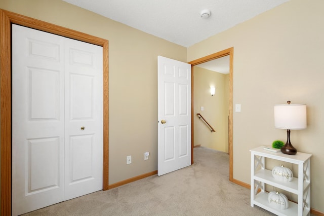 114006 Hundertmark Rd, Chaska, MN 55318 - bedroom featuring light carpet and baseboards