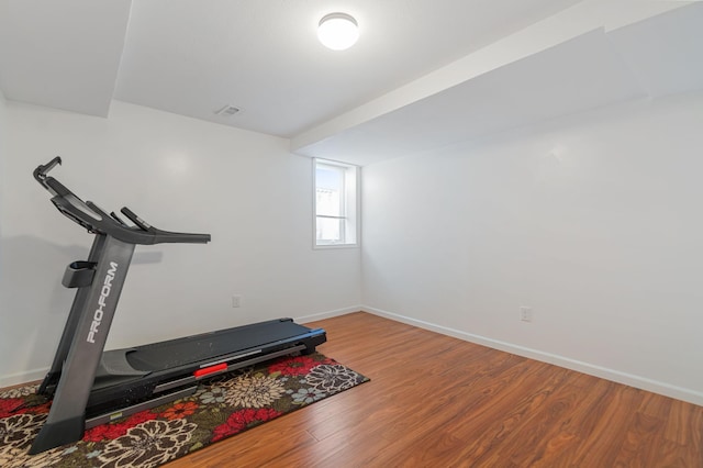 114006 Hundertmark Rd, Chaska, MN 55318 - exercise area featuring wood finished floors and baseboards