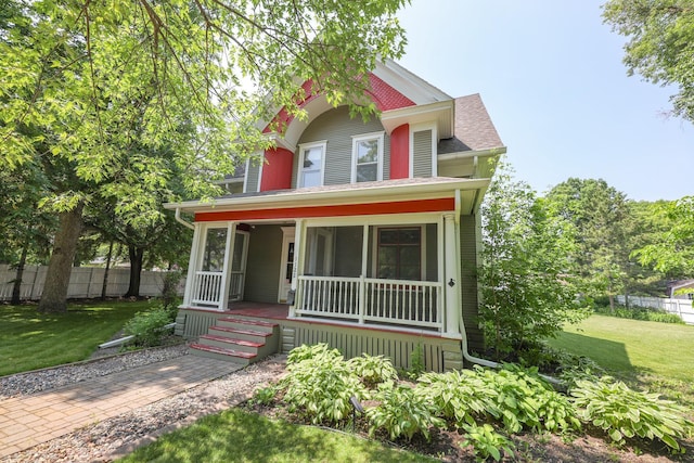 1122 Fillmore St, Alexandria, MN 56308 - victorian house featuring a porch