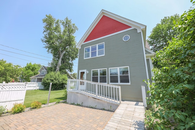 1122 Fillmore St, Alexandria, MN 56308 - back of house featuring a patio area and a wooden deck