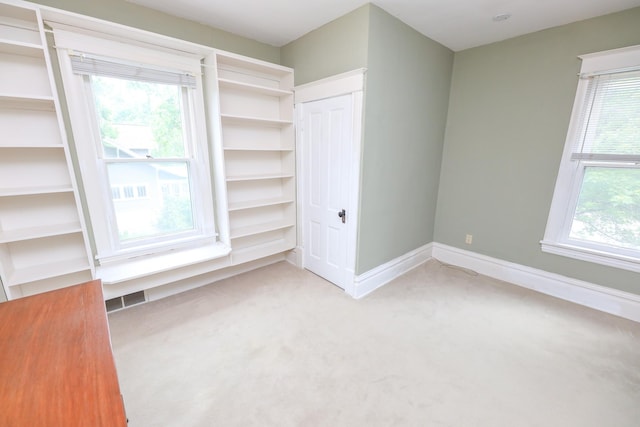 1122 Fillmore St, Alexandria, MN 56308 - unfurnished bedroom with light colored carpet and a closet