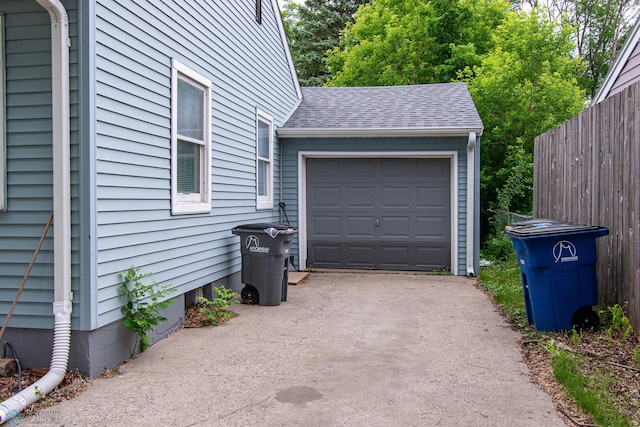 634 11th St N, Moorhead, MN 56560 - garage featuring driveway