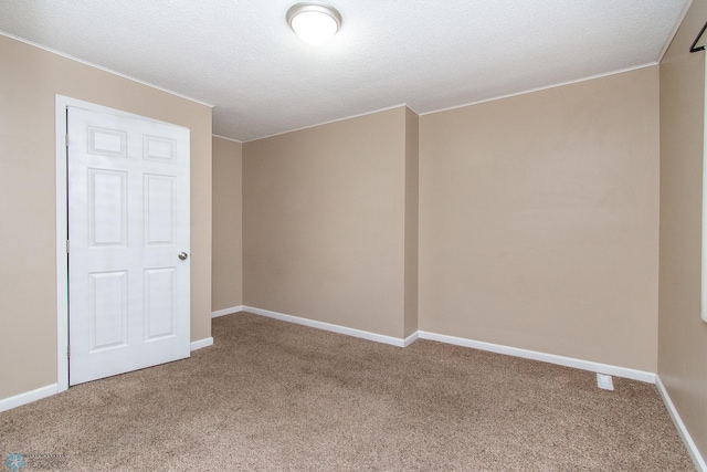 634 11th St N, Moorhead, MN 56560 - carpeted empty room with a textured ceiling