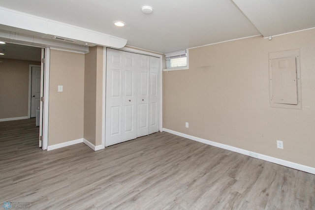 634 11th St N, Moorhead, MN 56560 - below grade area with light wood finished floors, electric panel, and recessed lighting