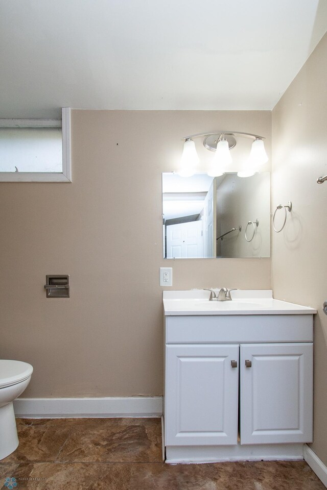 634 11th St N, Moorhead, MN 56560 - bathroom featuring toilet and vanity