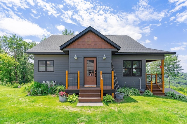 26887 709th St, Lake City, MN 55041 - view of front facade with a front yard and roof with shingles