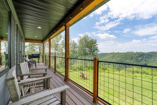 26887 709th St, Lake City, MN 55041 - wooden terrace with a forest view and a grill