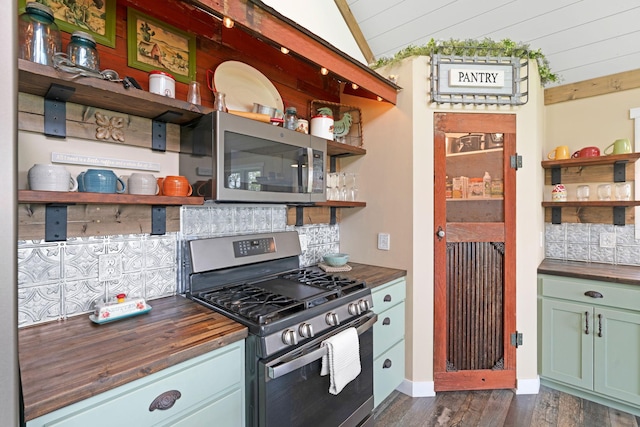 26887 709th St, Lake City, MN 55041 - kitchen featuring open shelves, stainless steel appliances, butcher block countertops, tasteful backsplash, and vaulted ceiling