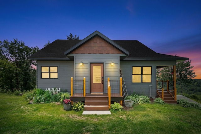 26887 709th St, Lake City, MN 55041 - bungalow featuring a front lawn and a shingled roof