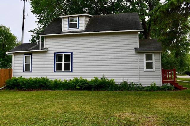 524 Horace Ave N, Thief River Falls, MN 56701 - view of property exterior featuring a shingled roof