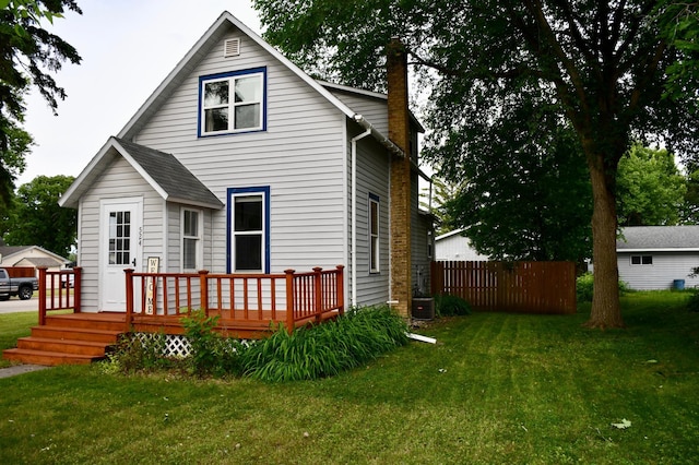 524 Horace Ave N, Thief River Falls, MN 56701 - back of house featuring a deck and a chimney