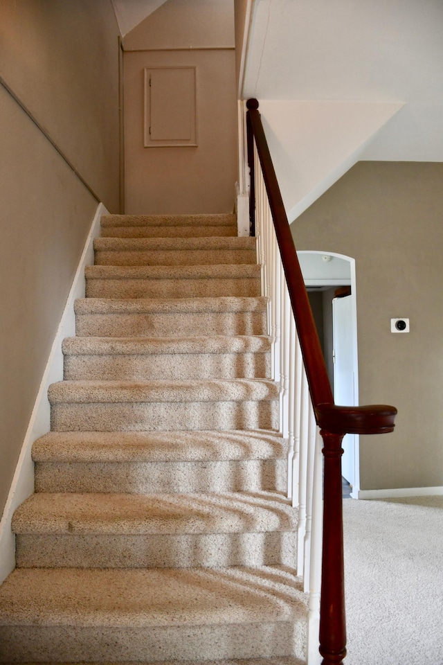 524 Horace Ave N, Thief River Falls, MN 56701 - stairs featuring carpet floors and lofted ceiling