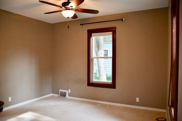 524 Horace Ave N, Thief River Falls, MN 56701 - carpeted empty room featuring ceiling fan and baseboards
