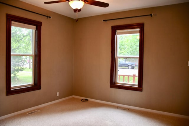 524 Horace Ave N, Thief River Falls, MN 56701 - carpeted empty room featuring ceiling fan and baseboards