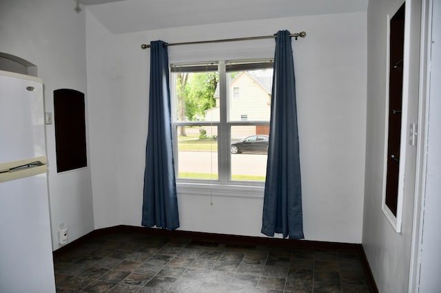 524 Horace Ave N, Thief River Falls, MN 56701 - spare room with stone finish floors