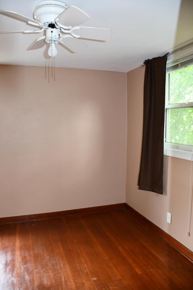 524 Horace Ave N, Thief River Falls, MN 56701 - unfurnished room featuring hardwood / wood-style flooring and ceiling fan