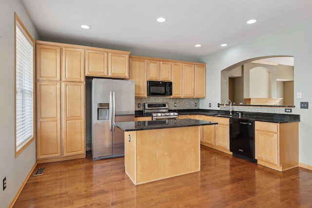 11350 Stratton Ave, Eden Prairie, MN 55344 - kitchen featuring black appliances, light brown cabinetry, a kitchen island, backsplash, and recessed lighting