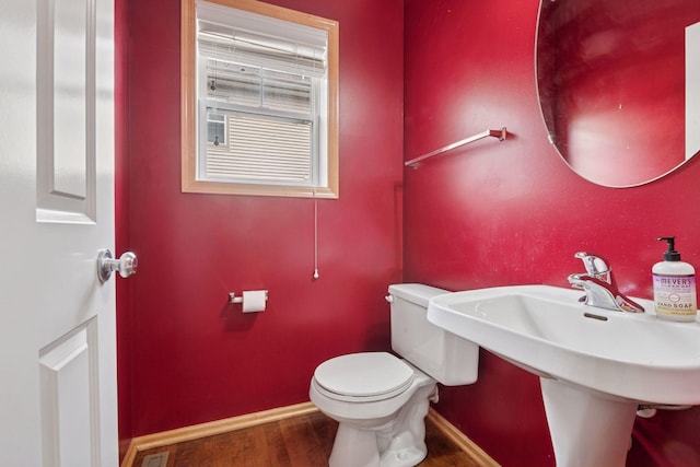 11350 Stratton Ave, Eden Prairie, MN 55344 - bathroom with toilet and wood finished floors