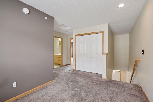 11350 Stratton Ave, Eden Prairie, MN 55344 - carpeted spare room featuring baseboards and a smoke detector