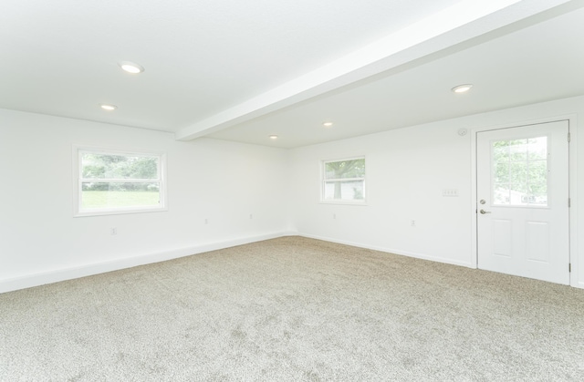 525 Warren Ave, Spring Valley, MN 55975 - carpeted spare room with healthy amount of natural light, recessed lighting, and beamed ceiling