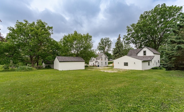 525 Warren Ave, Spring Valley, MN 55975 - view of green lawn with a shed