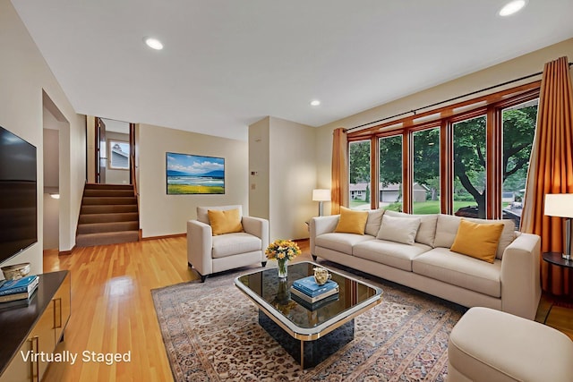 14136 Germane Ave, Apple Valley, MN 55124 - living room featuring stairs, light wood-style floors, and recessed lighting