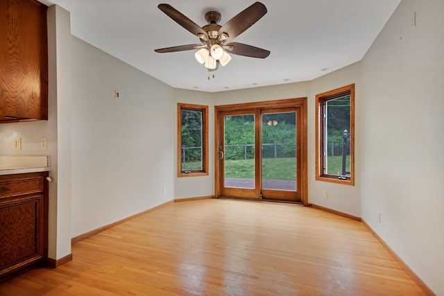 14136 Germane Ave, Apple Valley, MN 55124 - empty room featuring light wood finished floors and ceiling fan