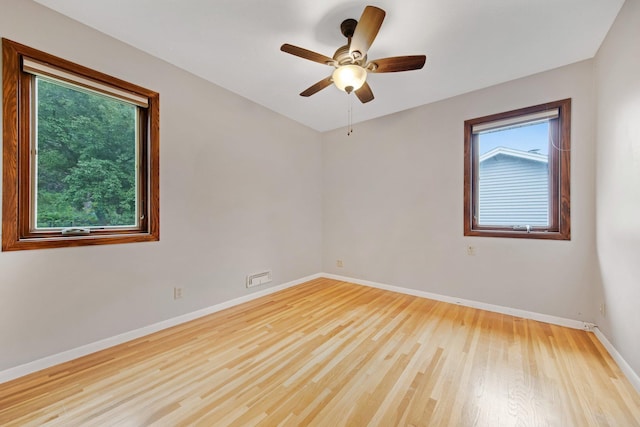 14136 Germane Ave, Apple Valley, MN 55124 - spare room with wood finished floors and ceiling fan