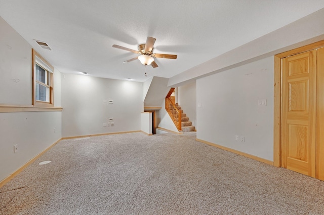14136 Germane Ave, Apple Valley, MN 55124 - carpeted spare room with ceiling fan and stairs