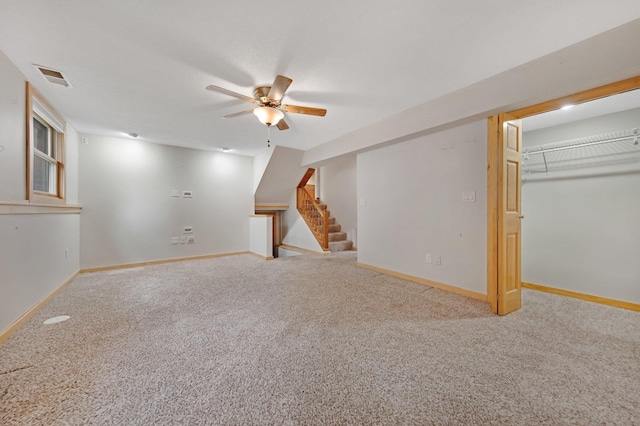 14136 Germane Ave, Apple Valley, MN 55124 - finished below grade area featuring a ceiling fan, stairs, and carpet floors