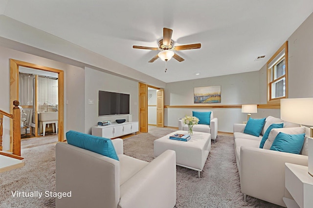 14136 Germane Ave, Apple Valley, MN 55124 - living area with ceiling fan and carpet floors